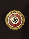 NSDAP 24 mm Golden Party badge marked  JOS. FUESS and numbered 47750
